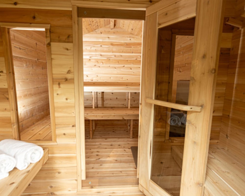 Georgian Cabin Sauna interior wooden benches with towels