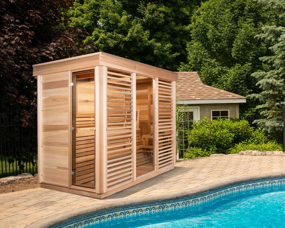 Leisurecraft Outdoors CU580 sauna next to a pool