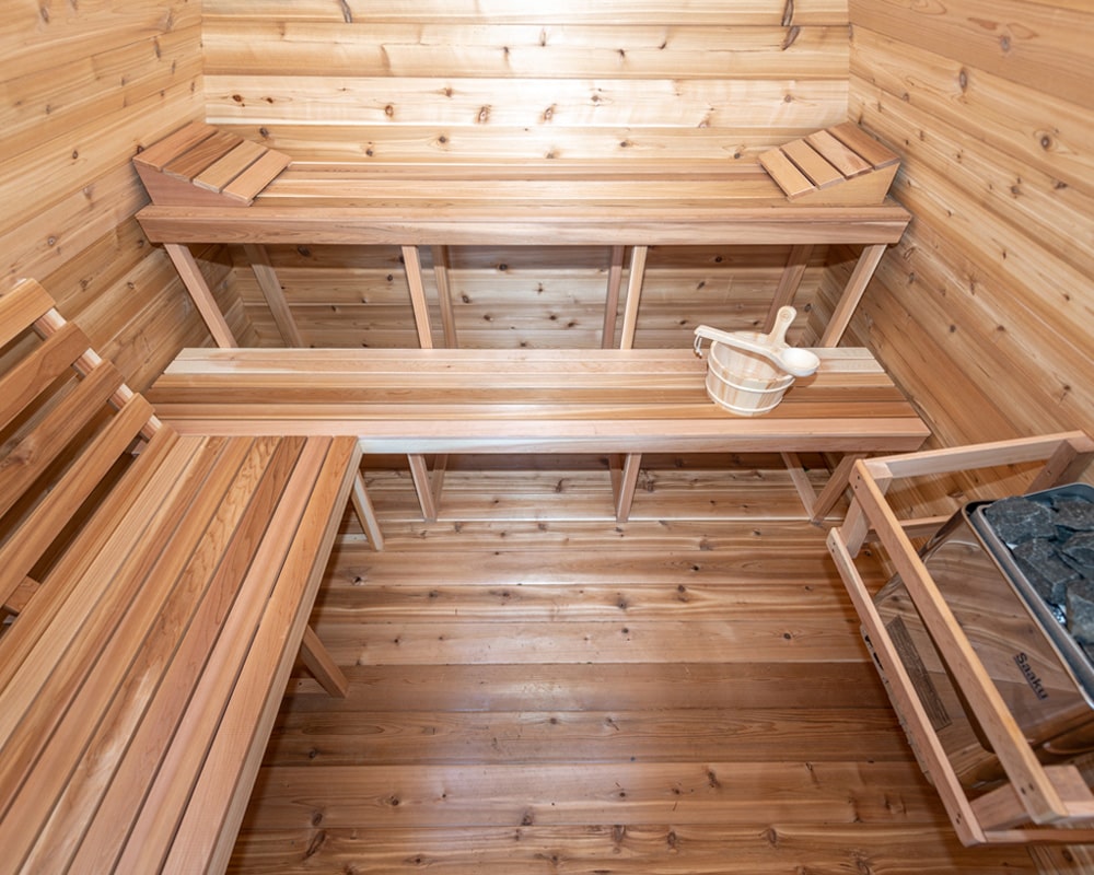 sauna interior: benches and accessories with heater