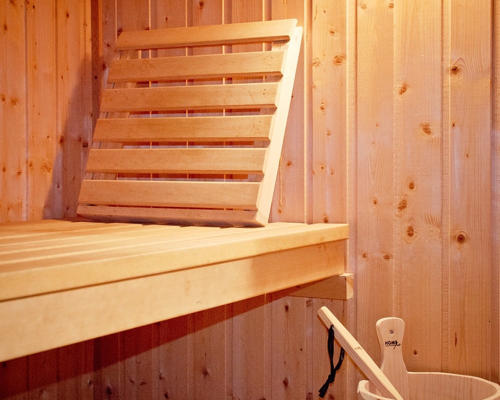 sauna interior: bench and accessories