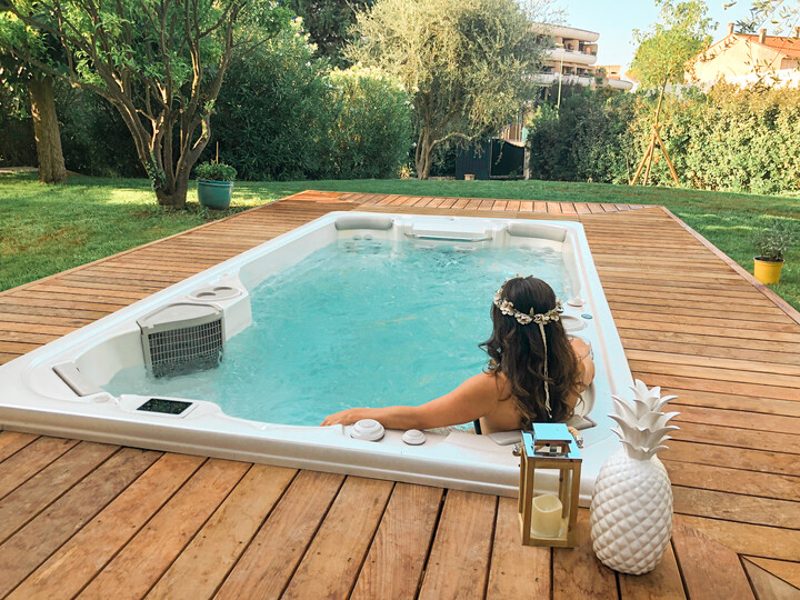 Vaulted swim spa installation with removable decking