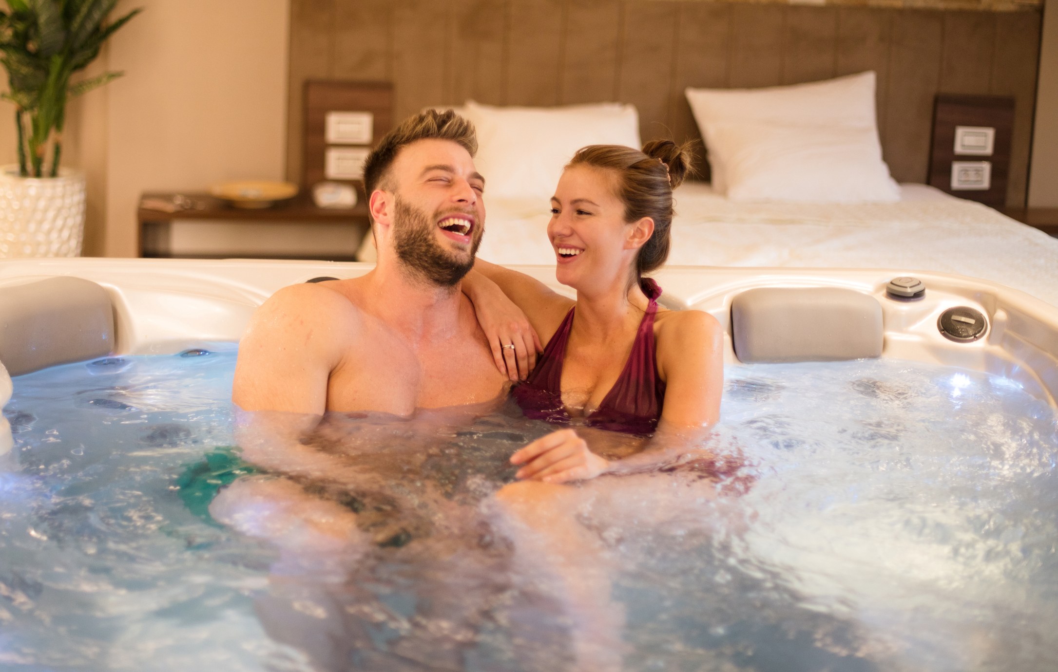 Young couple in hot tub
